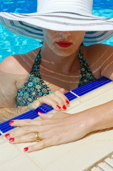 Woman in a pool — Stock Photo, Image