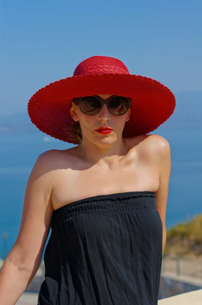 Portrait of woman in a straw hat — Stock Photo, Image