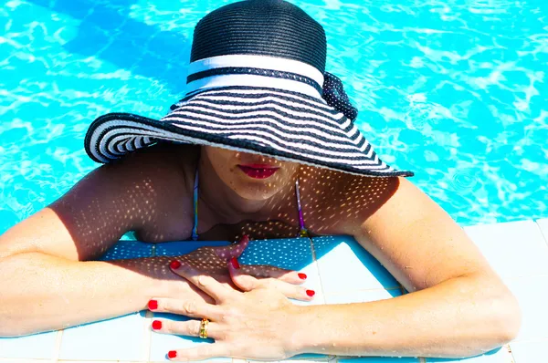 Woman in a pool — Stock Photo, Image