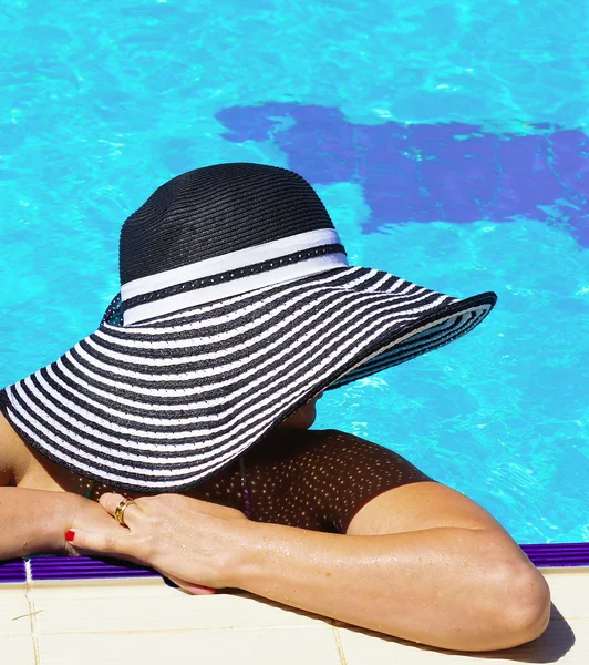 Woman in a pool — Stock Photo, Image