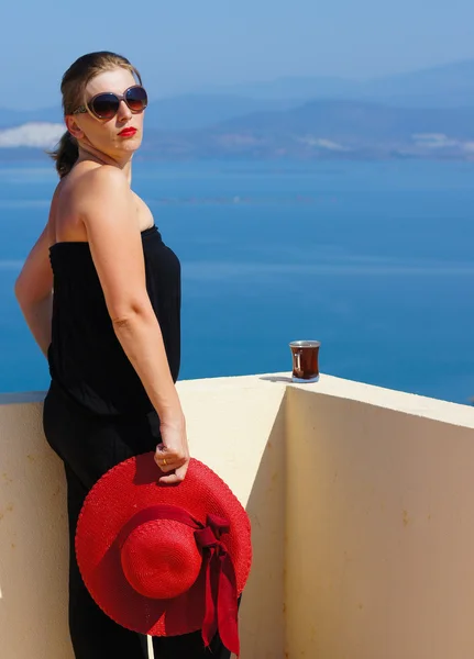 Portrait of woman in a straw hat — Stock fotografie