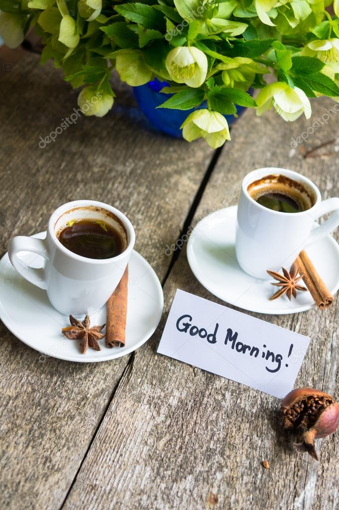 Cup of coffee and flowers — Stock Photo © Elet_1 45350431