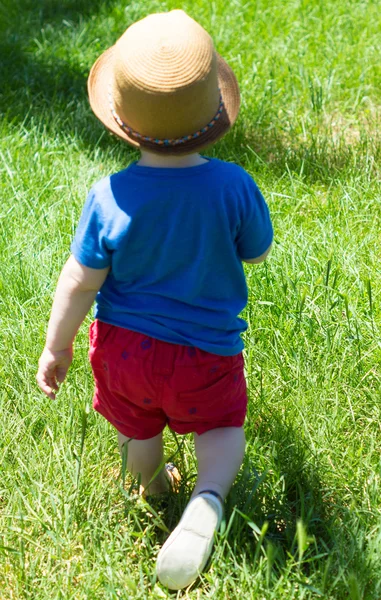Little boy is walking outdoor — Stock Photo, Image