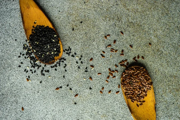 Overhead View Vintage Wooden Spoons Black Sesame Flax Seeds — Stockfoto