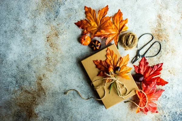 Autumnal Gift Box Wrapping Concept Thanksgiving Holiday Concrete Background — Zdjęcie stockowe