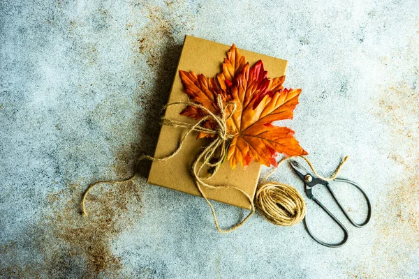 Autumnal Gift Box Wrapping Concept Thanksgiving Holiday Concrete Background — Zdjęcie stockowe