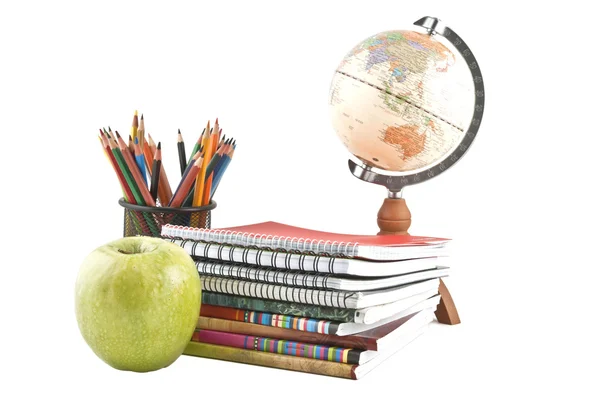 Küre, not defteri yığını ve kalem. çuval ve öğrenci studi