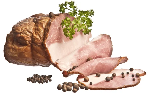 La carne de cerdo cocida adornada por el pimiento y el perejil sobre el bac blanco — Foto de Stock