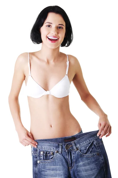 Young fit woman with big pants Stock Image