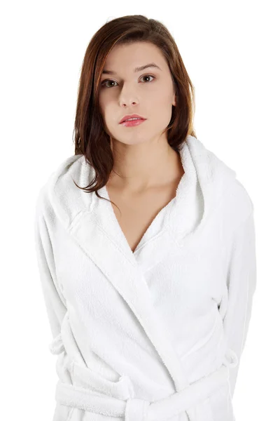 Portret van jonge mooie vrouw in badjas — Stockfoto