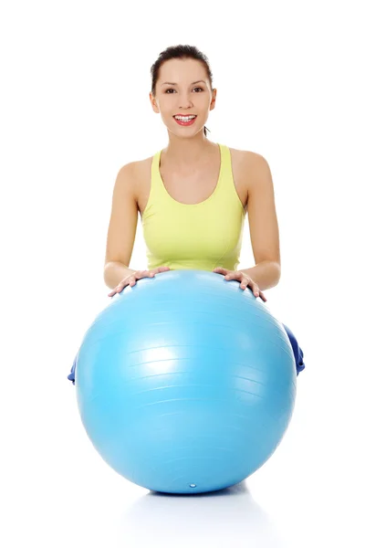 Woman with fitness ball Stock Picture