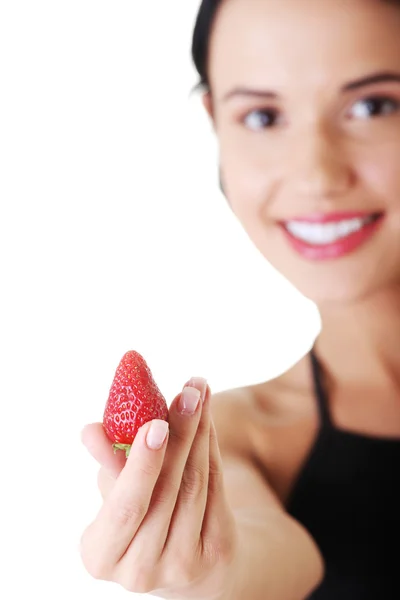 Happy young woman with strawberry. — Stock Photo, Image