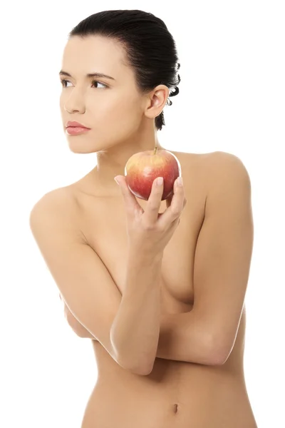 美しい女性は、リンゴを押し赤. — ストック写真