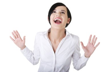 Portrait of surprised excited young business woman looking up clipart