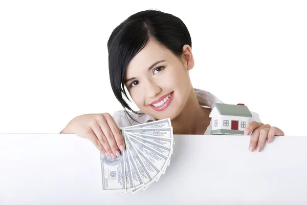 Real estate agent with blank sign board. — Stock Photo, Image