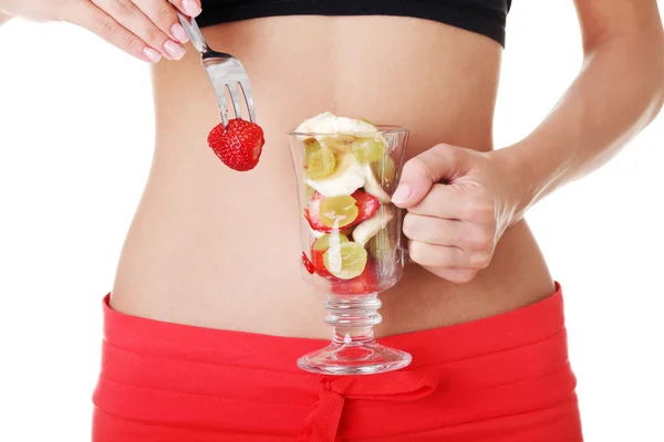 Pretty fit belly and fruit salad — Stock Photo, Image