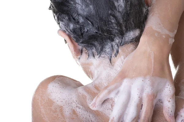 Young fit woman in shower Stock Picture