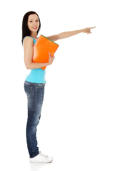 Happy , excited young woman pointing on copy space — Stock Photo, Image