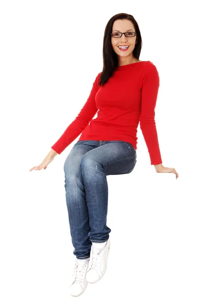 Yong casual woman sitting — Stock Photo, Image