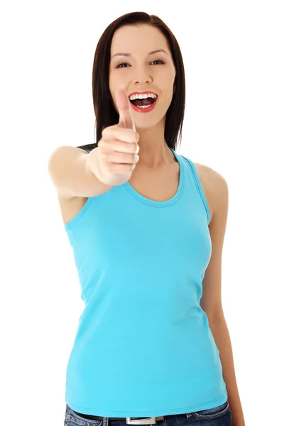 Beautiful young woman showing thumbs up sign — Stock Photo, Image