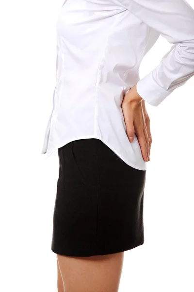 Business woman with back pain — Stock Photo, Image