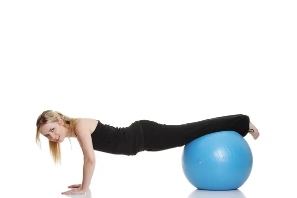 Young beautiful woman during fitness time and exercising — Stock Photo, Image