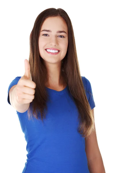 Beautiful young woman in casual clothes gesturing thumbs up. — Stock Photo, Image