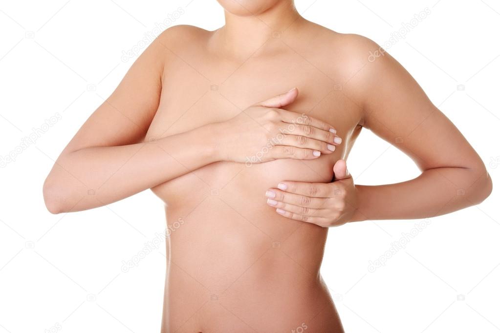 Woman examining breast mastopathy or cancer