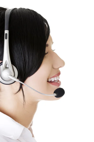 Beautiful young call-center assistant smiling — Stock Photo, Image