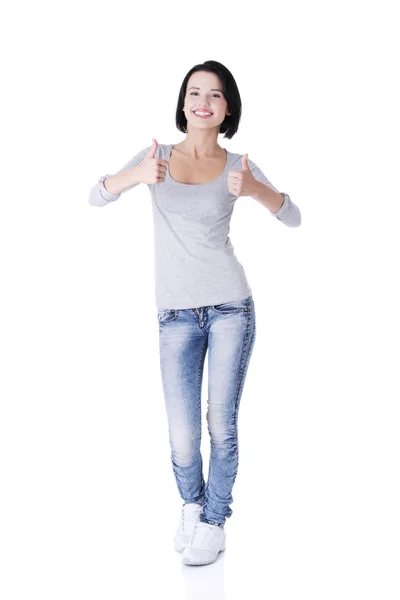 Beautiful young woman gesturing thumbs up. — Stock Photo, Image