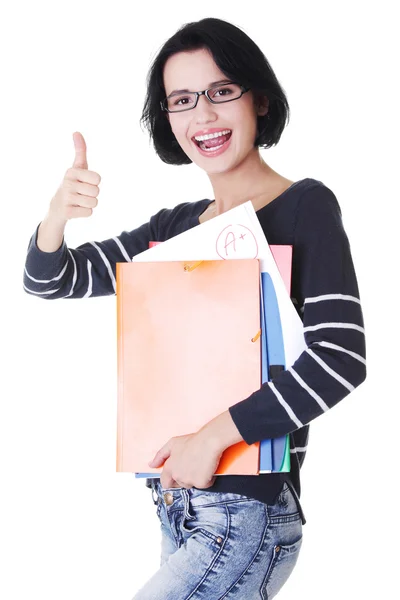 Estudiante mujer con cuadernos mostrando gesto ok — Foto de Stock