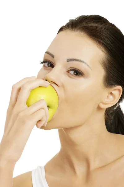 Beautiful woman holding green apple. — Stock Photo, Image