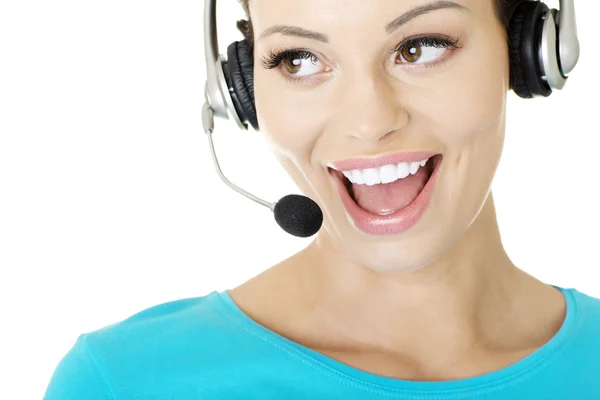 Beautiful young call-center assistant smiling — Stock Photo, Image