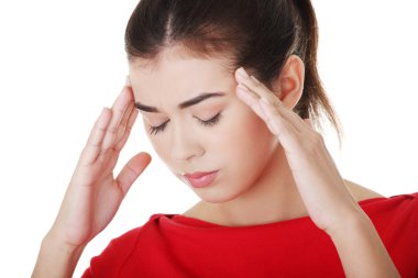 kadın tapınaklar tutan bir baş ağrısı ile