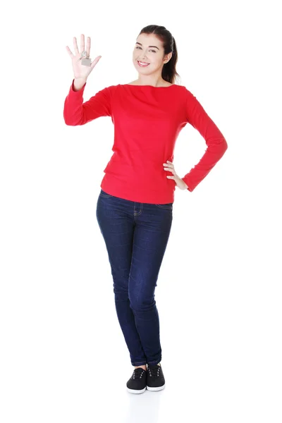 Young woman with keys to her home — Stock Photo, Image