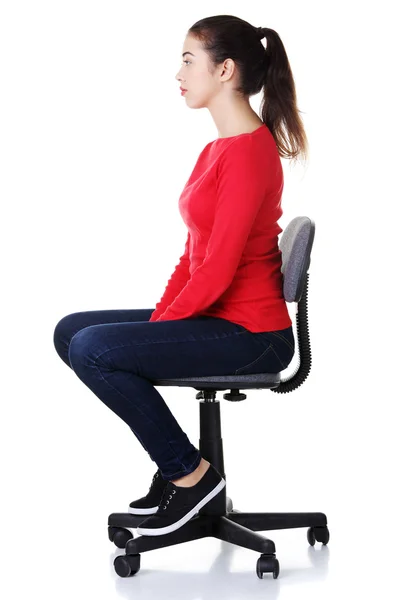 Young happy woman sitting on a wheel chair — Stock Photo, Image