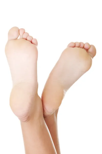 Mooi vrouwtje een voet en een hiel — Stockfoto