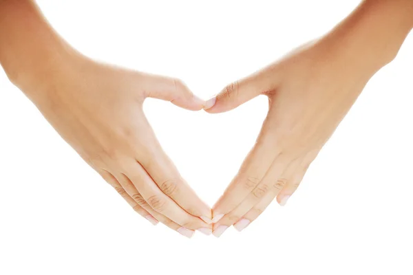 Mani femminili nella forma di cuore — Foto Stock