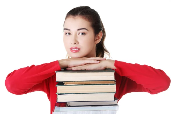 Glückliche junge Studentin mit Büchern — Stockfoto