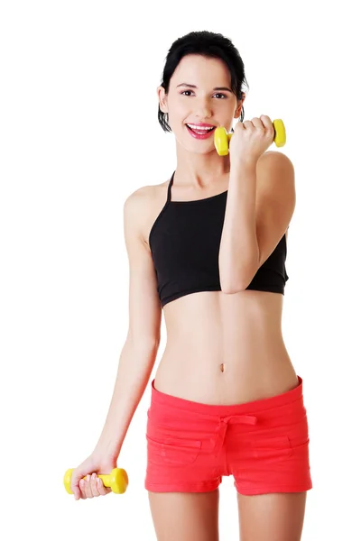 Fitness dívka je cvičit s činkami — Stock fotografie