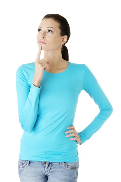 Thoughtful female student looking up — Stock Photo, Image