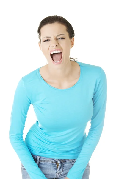 Jovem mulher casual gritando com raiva — Fotografia de Stock