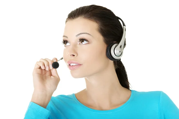 Beautiful young call-center assistant smiling — Stock Photo, Image