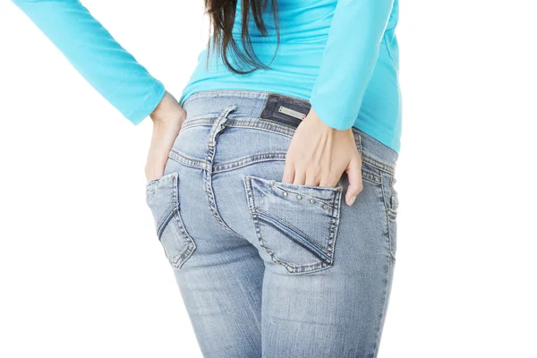 Passa kvinnlig rumpa i jeans — Stockfoto