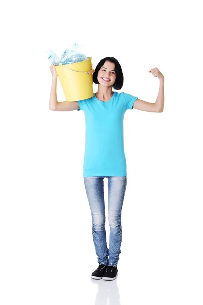 Beautiful young woman holding recycling bin — Stock Photo, Image