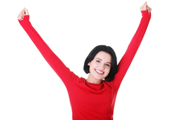 Excited young woman with fists up — Stock Photo, Image