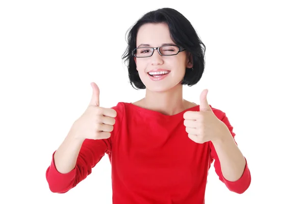 Woman in casual clothes gesturing thumbs up. — Stock Photo, Image