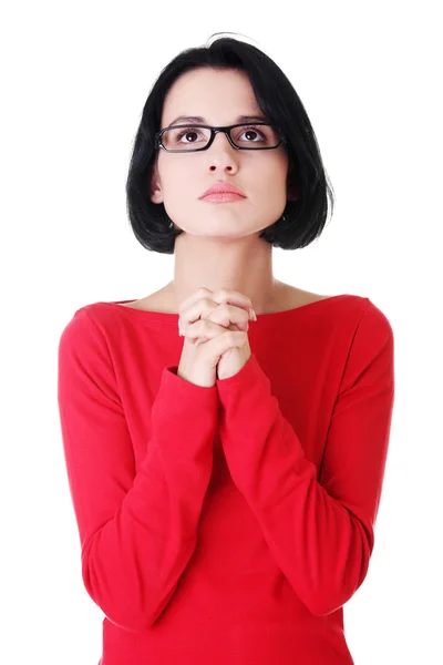Portrait of a young caucasian woman praying — Stock Photo, Image