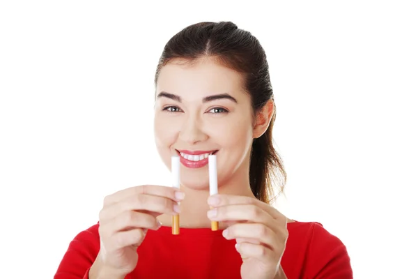 Vrouw met sigaret en elektronische sigaret — Stockfoto