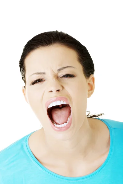 Jonge vrouw schreeuwen met woede — Stockfoto